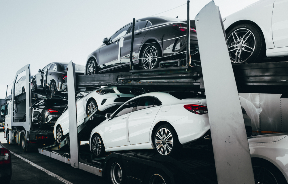 Learn how to choose between enclosed and open car shipping
