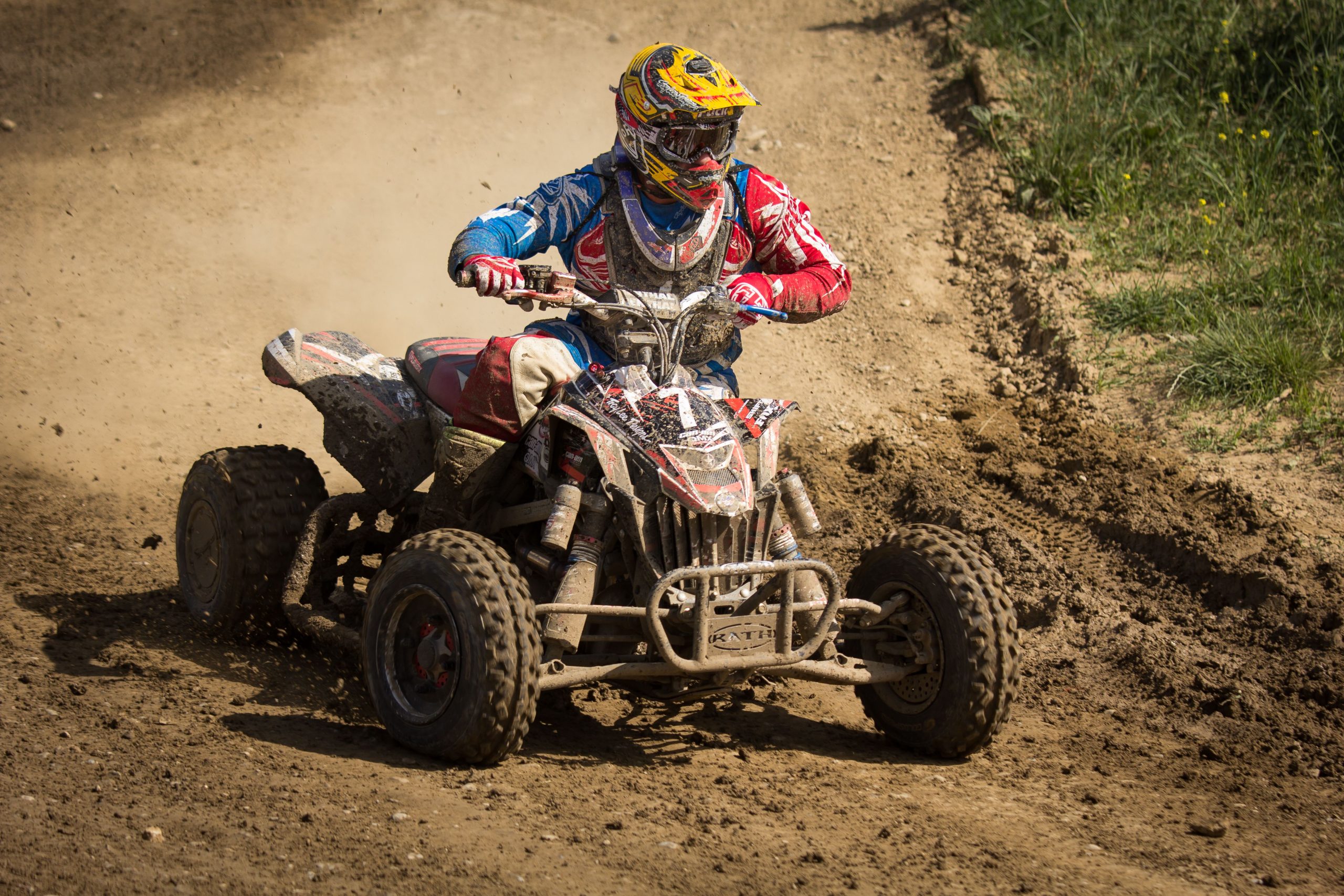 ATV and off-road vehicle on a dirt track