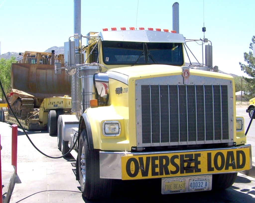 Heavy-haul truck transporting a Caterpillar bulldozer