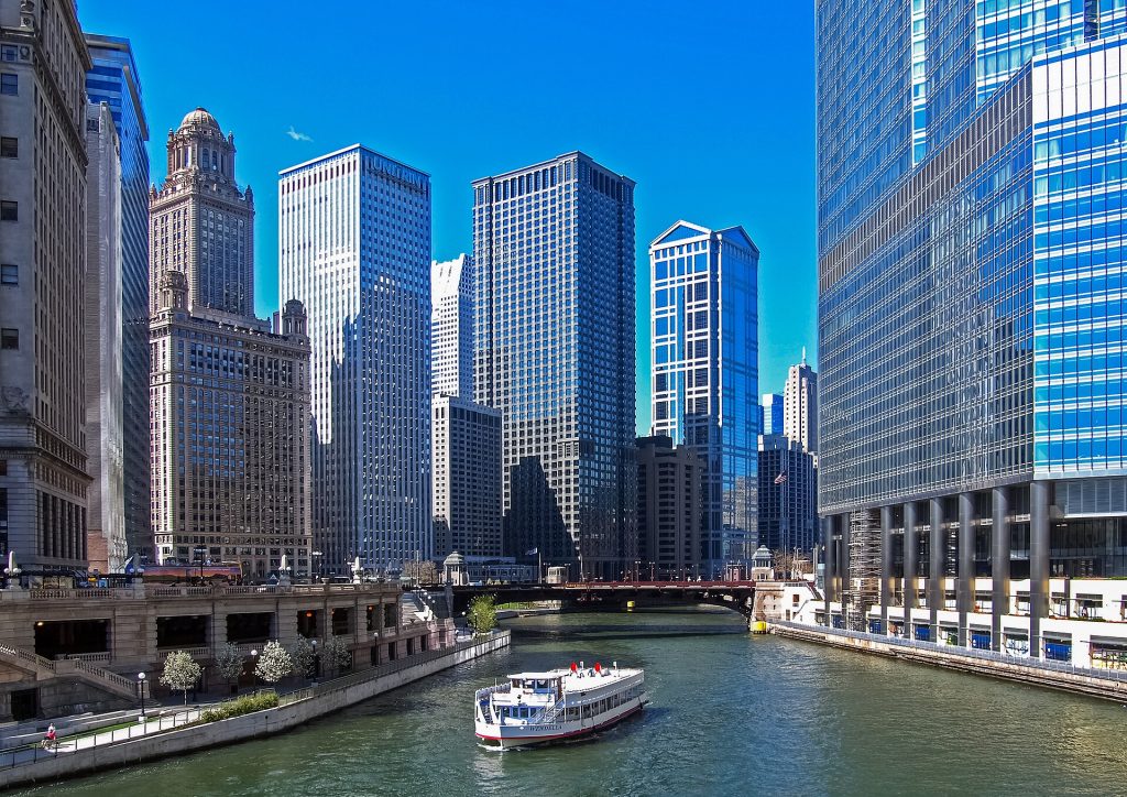 Chicago skyline and river representing Illinois auto transport