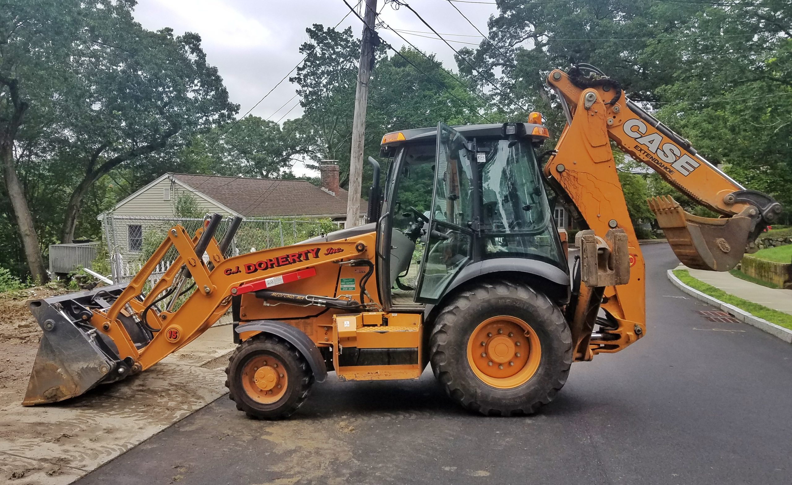 CASE backhoe loader for construction equipment transport