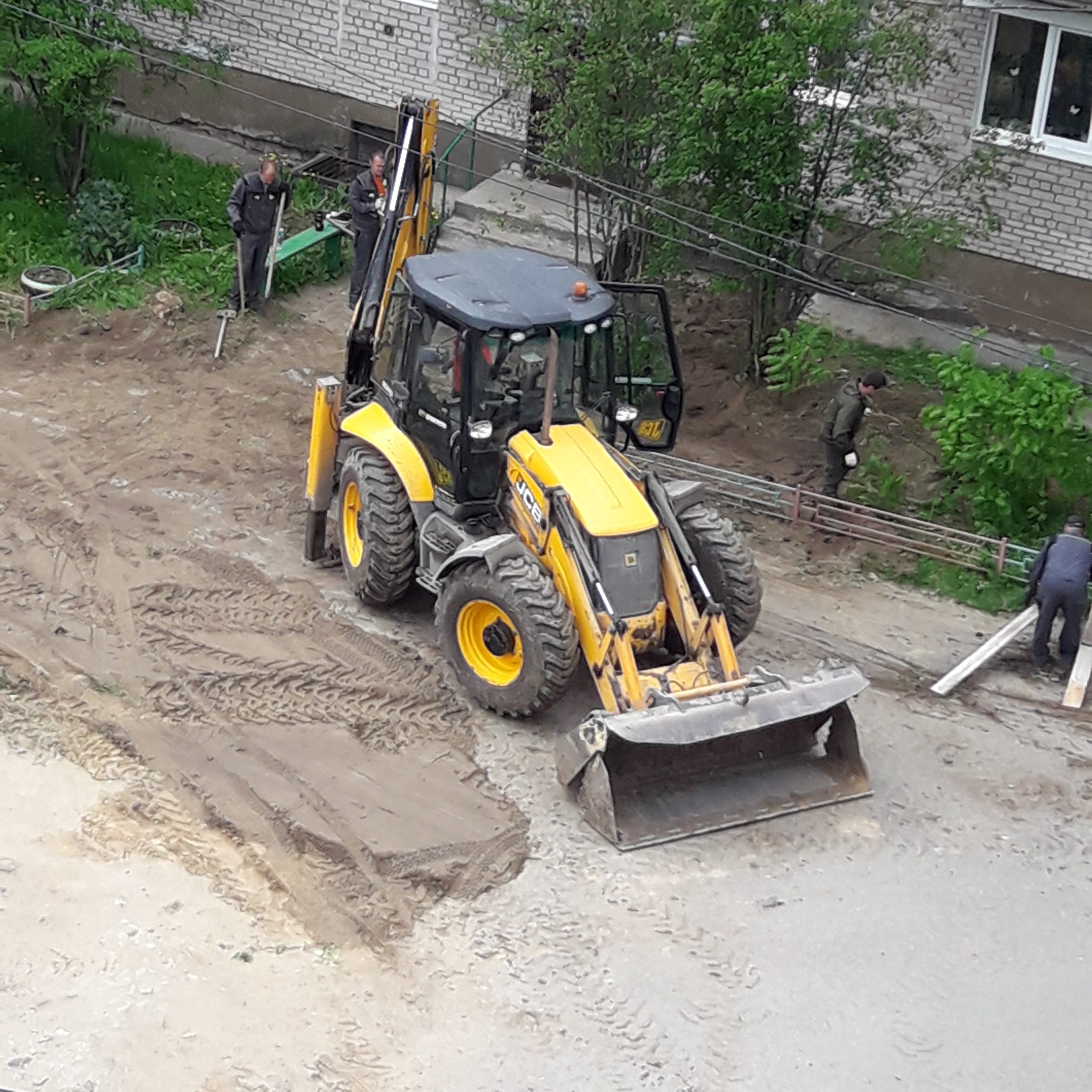 JCB backhoe loader for equipment transport