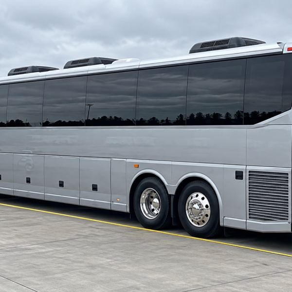 Illustration of a surveyor measuring a motorcoach on a level apron